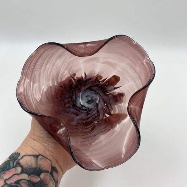 hand blown glass bowls in hand to show size