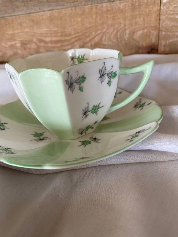 rare Shelley tea cups mint green panels with clover on white panels