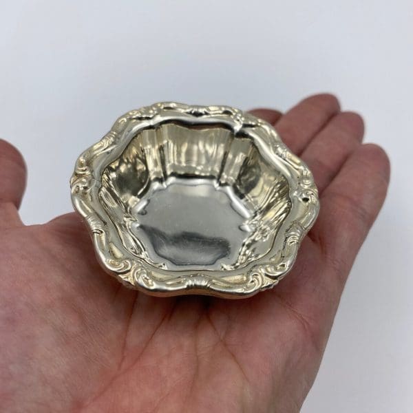 Sterling Silver nut dish in hand to show size